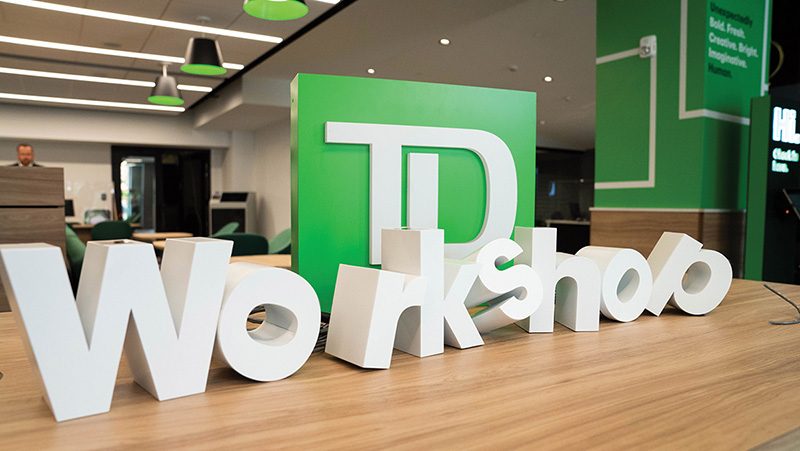 3-D letters that spell workshop sitting on desk