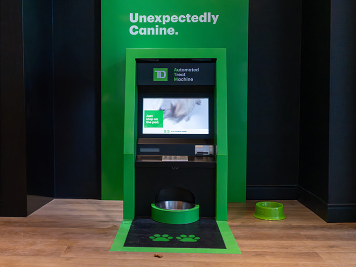 Automated Treat Machine which dispenses treats to TD customers’ pets