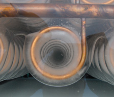 Copper coils with ice.