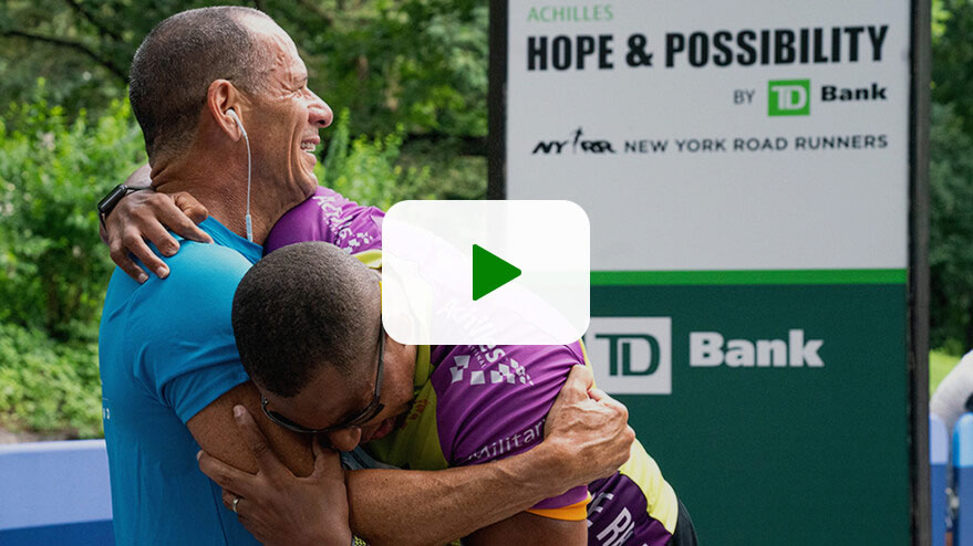 Play a video to watch Achilles athletes overcome hurdles on and off the track